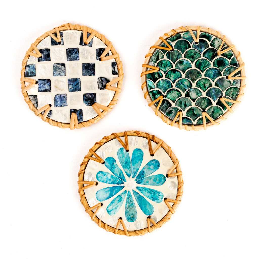 Three decorative coasters with different patterns on a white background